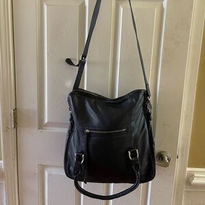 Massi black leather large  fold over shoulder bag with silver tone hardwares .